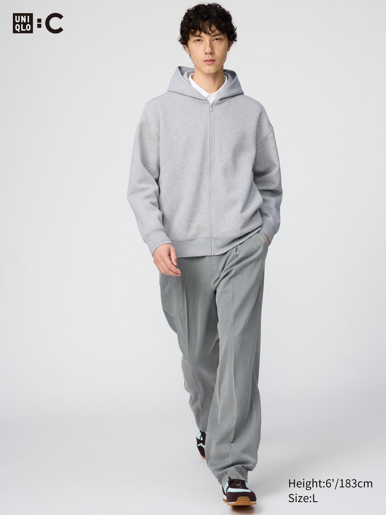 Широкие зауженные брюки в складку